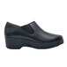 A black leather Shoes For Crews Kelsey women's shoe with a rubber sole.