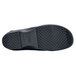 The black sole of a Shoes For Crews Kelsey women's shoe.