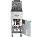 A Main Street Equipment liquid propane stainless steel floor fryer with the door open.