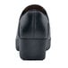 The back of a black Shoes For Crews Kelsey women's casual shoe.