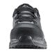 An ACE Aster women's water-resistant safety shoe in black and gray on a table.