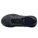 The back of a black Shoes For Crews Vitality II women's athletic shoe with a lace.