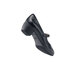 A black Shoes For Crews Vita women's dress shoe with a buckle on the heel.
