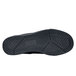 The black rubber sole of a Shoes For Crews Milano women's shoe.