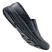 A pair of black Shoes For Crews slip-on shoes for men with rubber soles.