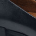 A close up of a black Shoes For Crews Willa non-slip dress shoe.