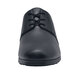 A black Shoes For Crews Madison III women's dress shoe with laces.