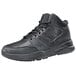 A black Shoes For Crews men's athletic shoe with laces.