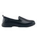 A black Shoes For Crews slip-on shoe with a rubber sole.