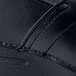 A close up of a black leather Dansko shoe.