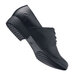 A black Shoes For Crews Madison III women's dress shoe with rubber soles.