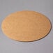 A 12" corrugated white cardboard circle on a gray surface.