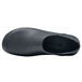 A black Shoes For Crews women's clogger shoe with a rubber sole.