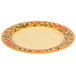 A white GET Venetian wide rim plate with a green leaf design.