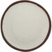 A white plate with brown trim.