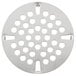 A circular metal strainer plate with holes in it.