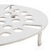 A stainless steel strainer plate with holes.