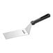 A Victorinox square edge turner with a black handle.