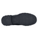 A black shoe with a black sole.