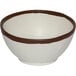 A white melamine bowl with brown trim.