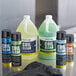 A blue and white can of Noble Chemical Tech Line No Rinse Evaporator Coil Cleaner next to a bottle of liquid.