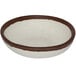 A white melamine ramekin with brown trim.