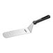 A Victorinox perforated turner with a black handle.