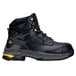 A close-up of a black ACE Burren work boot with yellow accents.