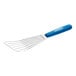 A Dexter-Russell Sani-Safe blue slotted fish/egg turner with a blue handle.