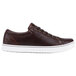 A brown leather MOZO casual shoe with a white sole.