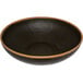 a close-up of a black bowl