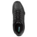 A close-up of a black SR Max Rialto athletic shoe with laces.
