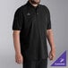 A man wearing a black National Patrol polo shirt.
