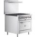 A large stainless steel Cooking Performance Group range with 6 burners and a convection oven.