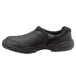 A black SR Max slip-on shoe with a rubber sole.