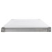 A close-up of a solid stainless steel shelf.
