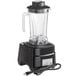 a black blender with a clear glass container