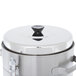 A stainless steel Grindmaster hot water boiler with a lid and handle.