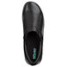 A close-up of a black SR Max Geneva slip-on shoe with a green logo.