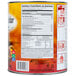A large can of Muy Fresco Aged Cheddar Nacho Cheese Sauce with nutritional information and preparation instructions on the label.