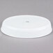 A white oval porcelain serving platter.