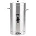 A silver metal Bunn 3 gallon iced tea dispenser with a black handle.