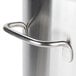 A close-up of a metal handle on a Bunn 3 gallon iced tea dispenser.