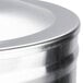 A close up of a stainless steel Bunn 3 gallon iced tea dispenser.