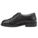 a black shoe with a white background