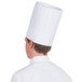 a person wearing a chef's hat