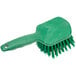 A green Carlisle Sparta pot scrub brush with a handle.