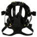 A black 3M full face respirator mask with yellow straps.