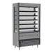 A Beverage-Air VueMax air curtain merchandiser with glass doors and shelves.