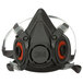 A black and clear 3M 6300 Half Facepiece Reusable Respirator.